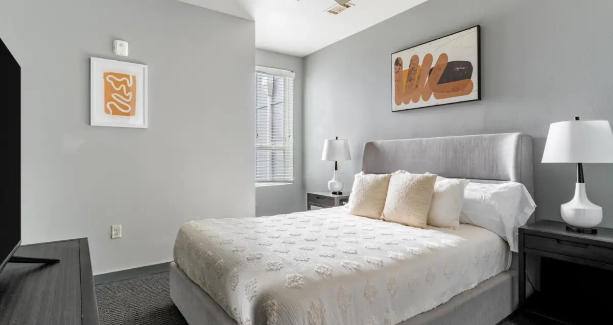 furnished bedroom interior at The Nine at Memphis, University of Memphis apartments