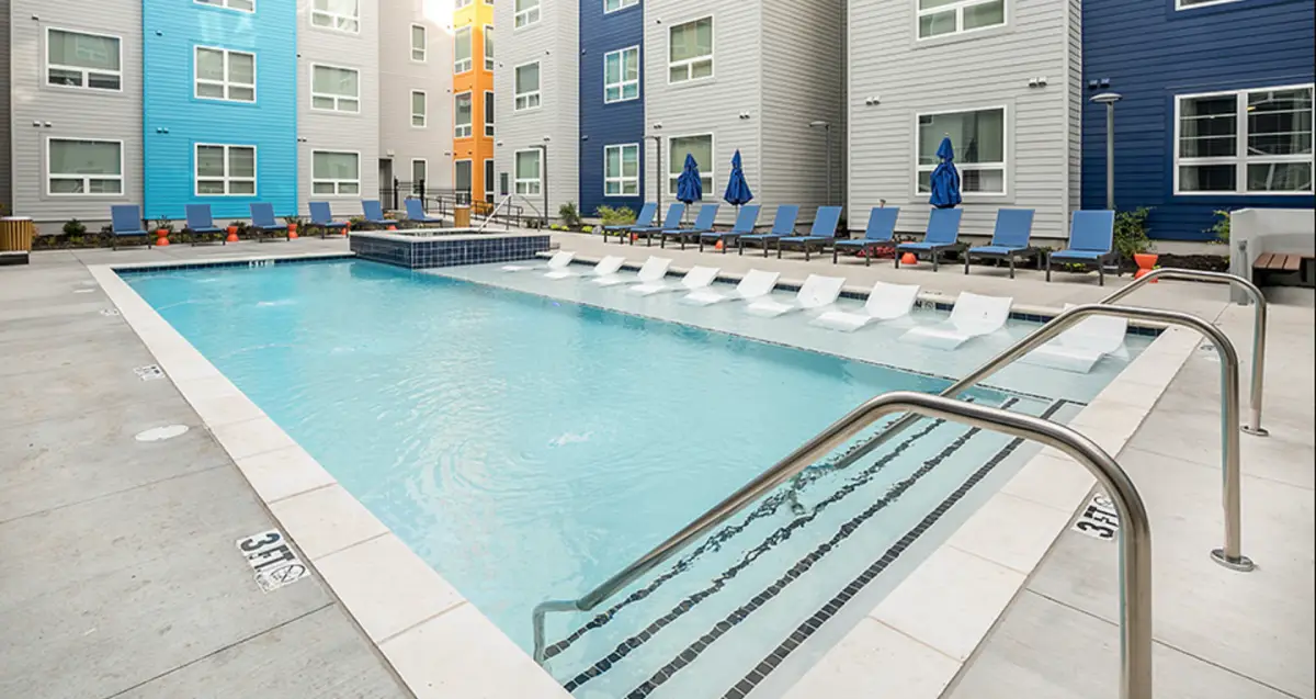 pool lounge area at The Nine at Memphis, apartments near U of Memphis