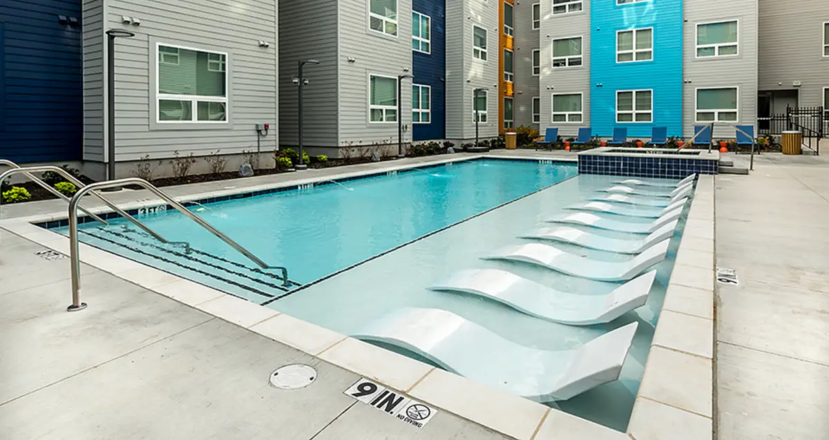 resort-style swimming pool at The Nine at Memphis, University of Memphis apartments